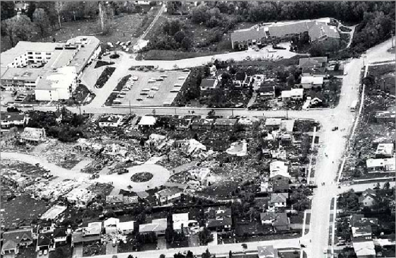 Aerial view of a narrow path of destruction on Murray Street in Barrie, Ontario.