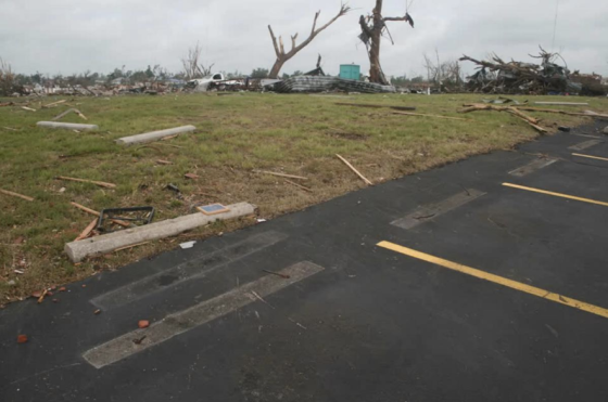 After leveling the Elk Lodge and causing five fatalities, the tornado continued to rapidly intensify as it devastated medical buildings just west of St. Johns Hospital. Large concrete parking stops weighing approximately 300lbs were ripped from their steel-anchors and hurled more than 50 yards.