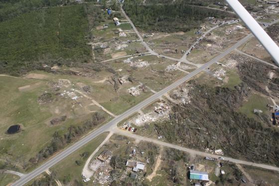Second view of the tornado damage in southwestern Phil Campbell. The damaged storm cellar is visible at center left.