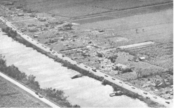 In 1964, Hurricane Hilda made landfall in Louisiana as a weakening category 3 storm. Before the hurricane's eye reached the coast, a violent tornado was spawned in the swampland 30 miles south of New Orleans. The F4 tornado travelled westward over a narrow strip of homes and buildings that lined a waterway, killing 22 residents. 