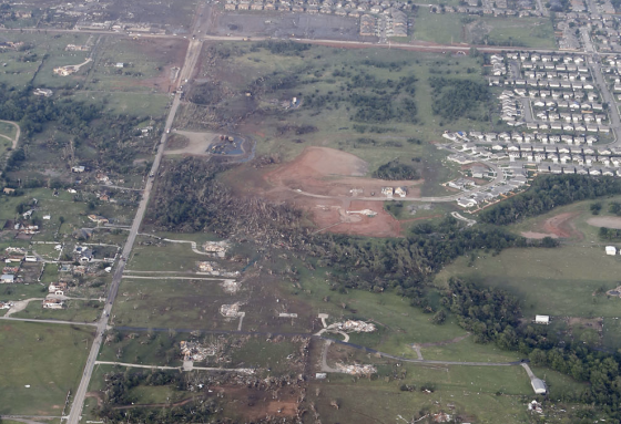 Ground scouring and empty foundations near Country Edge Drive, a half mile west of Moore. (Image by Steve Gooch)