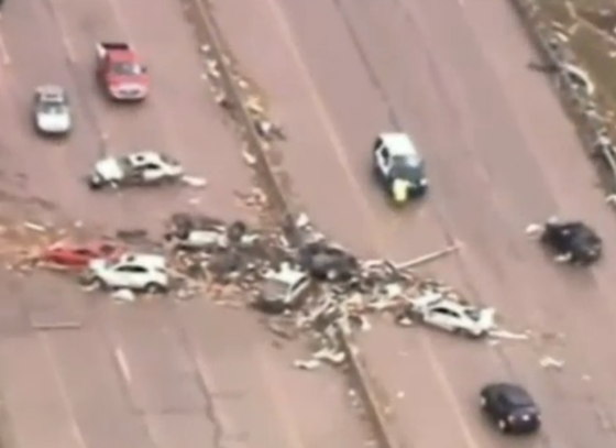 The remains of vehicles on the I-35. (Video still by KWTV)